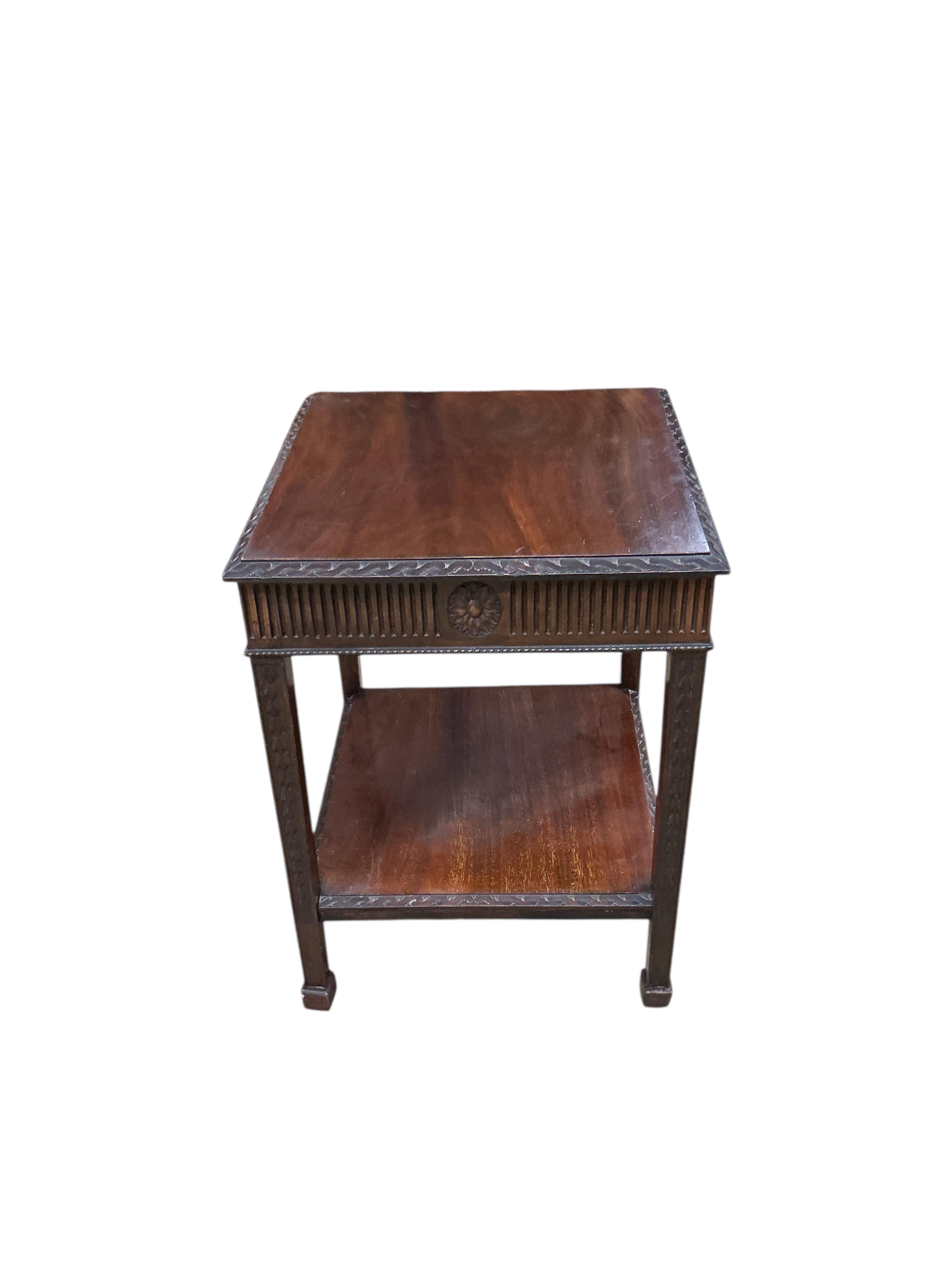 An Edwardian rectangular mahogany two tier occasional table, width 48cm, depth 47cm, height 64cm